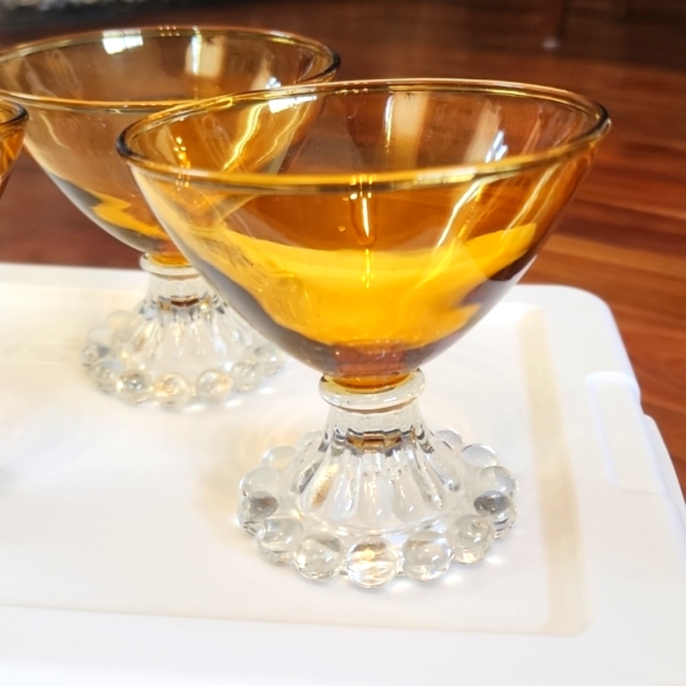 4 Amber glasses